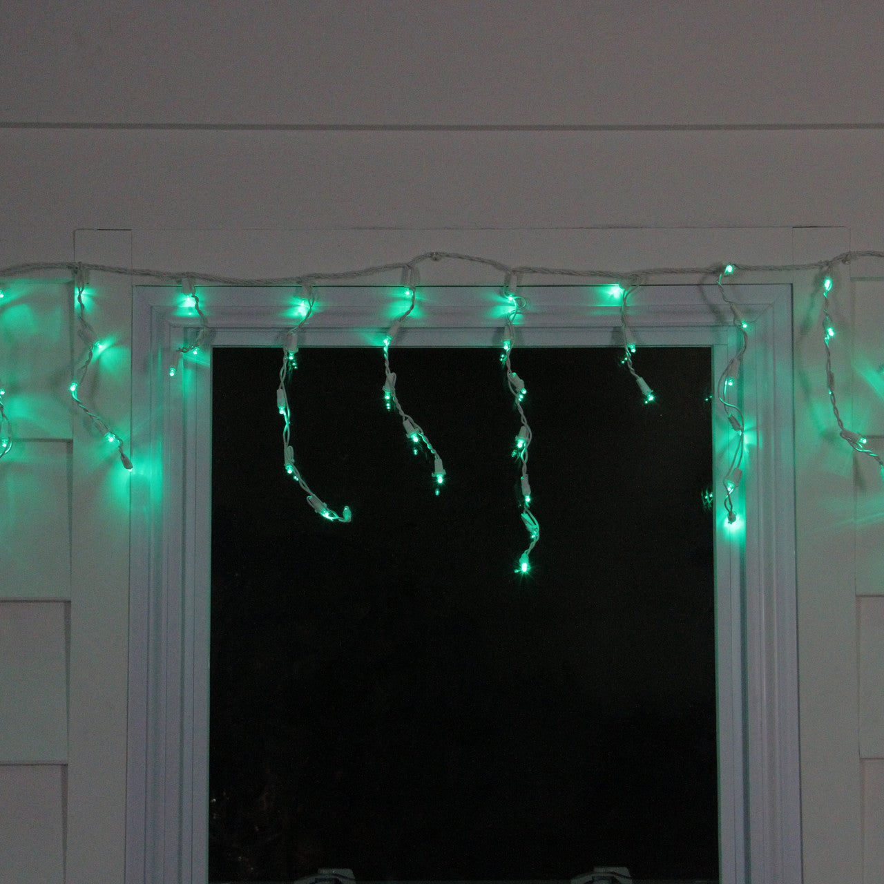 70 Green LED Wide Angle Icicle Christmas Lights - 5.25 ft White Wire