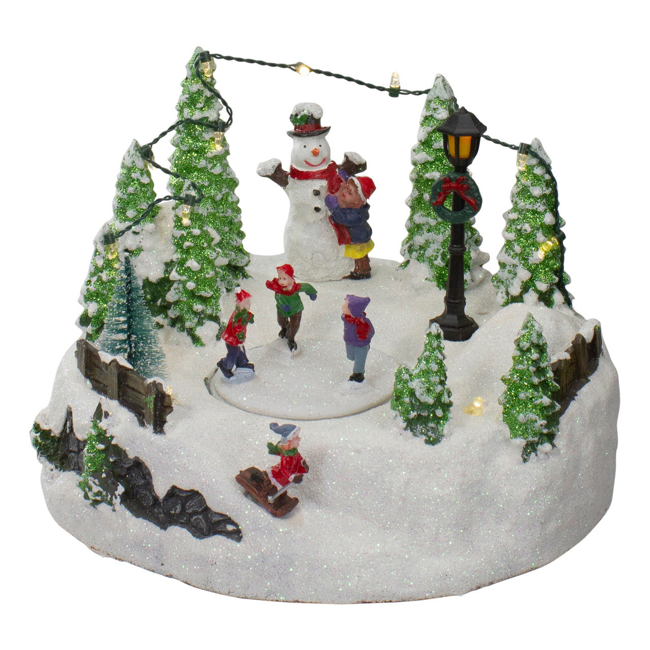 9" Lighted Christmas Scene with Moving Skaters and a Snowman